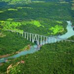 The Araguari River, in the state of Minas Gerais (Brazil), passes under the railway bridge that connects the city of Uberlândia to Brasília, Federal Capital.